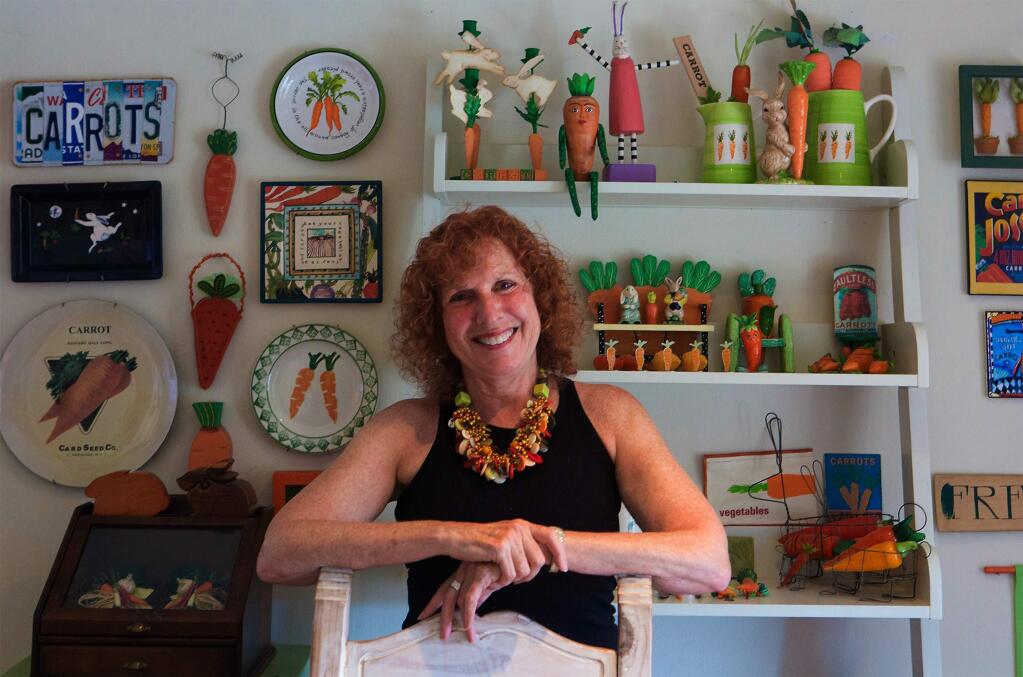 Heidi Geffen, proprietor of Tiddle E. Winks, Vintage 5 & Dime, on East Napa St., with her collection of things carrot.(Photo by Robbi Pengelly/Index-Tribune)