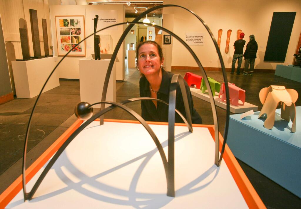 Lisa Demetrios and her 'Bouncing Ball' sculpture that is part of a display of three generations of art her family at the Petaluma Art Center on Monday January, 9, 2015. (SCOTT MANCHESTER/ARGUS-COURIER STAFF)