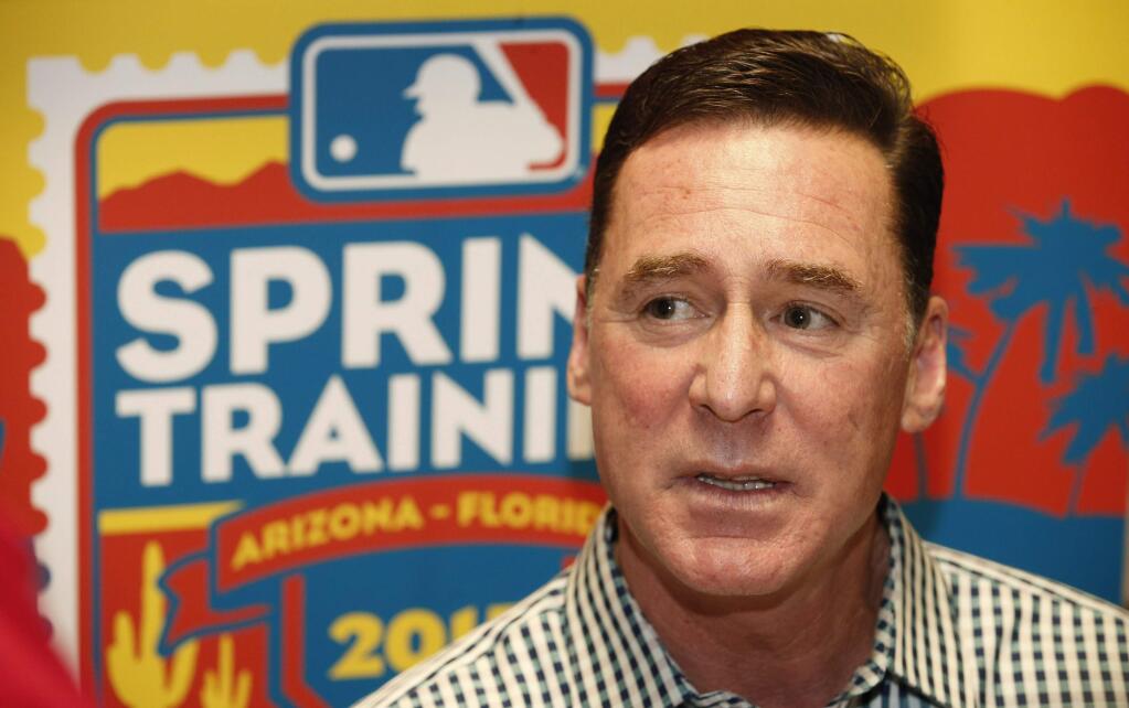 Oakland Athletics manager Bob Melvin talks with members of the media about the new rules in MLB baseball and other topics at spring training media day Monday, Feb. 23, 2015, in Phoenix. (AP Photo/Ross D. Franklin)
