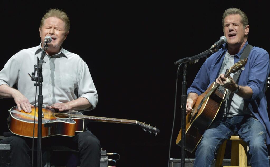 FILE - In this Jan. 15, 2014, file photo, Don Henley, left, and Glenn Frey of The Eagles perform on the 'History of the Eagles' tour at the Forum in Los Angeles. The Eagles' greatest hits album has surpassed Michael Jackson's 'Thriller' as the best-selling album of all-time. (Photo by John Shearer/Invision/AP, File)
