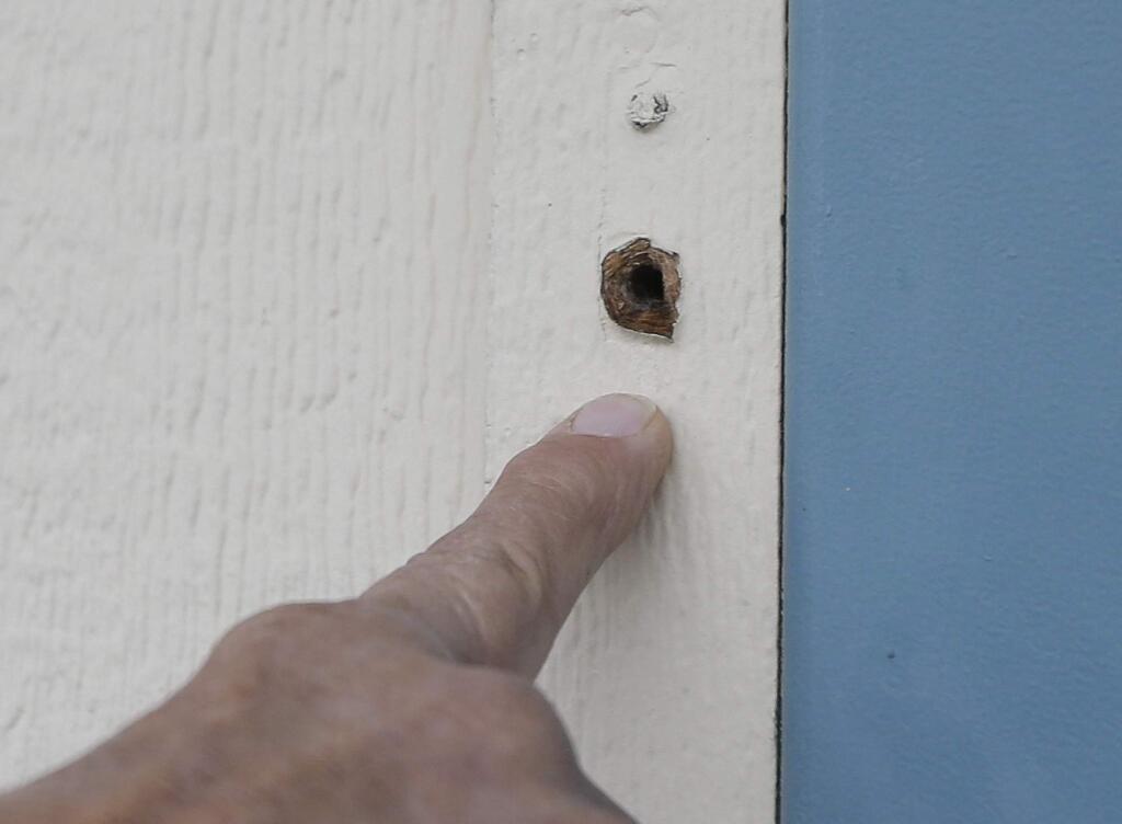 A bullet hole at Rancho Tehama Elementary School left by Kevin Neal's Nov. 15 shooting rampage. Neal killed five people, including his wife before being shot and killed by Tehama County sheriff's deputies. (RICH PEDRONCELLI / Associated Press)