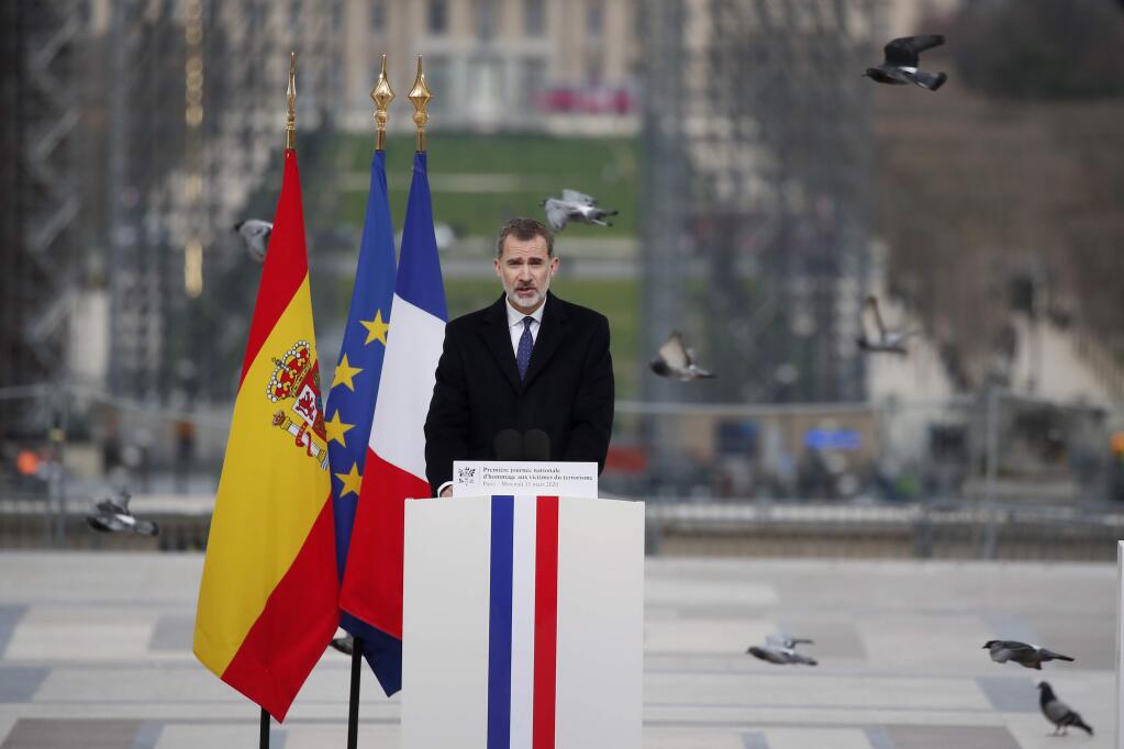 Spain's King Felipe VI delivers his speech during a ceremony to honor victims of terror attacks in Europe, on the 16th anniversary of Madrid attacks, at the Trocadero in Paris, Wednesday March 11, 2020. French President Emmanuel Macron and King of Spain Felipe VI are paying homage to victims of terrorism in a special ceremony prompted by attacks that hit both their countries and changed Europe's security posture. (AP Photo/Francois Mori)