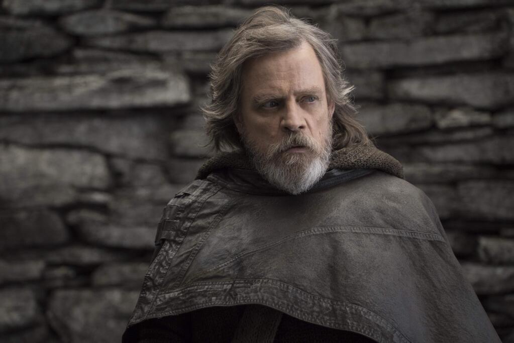This image released by Lucasfilm shows Mark Hamill as Luke Skywalker in 'Star Wars: The Last Jedi,' in theaters on Dec. 15. (John Wilson/Lucasfilm via AP)