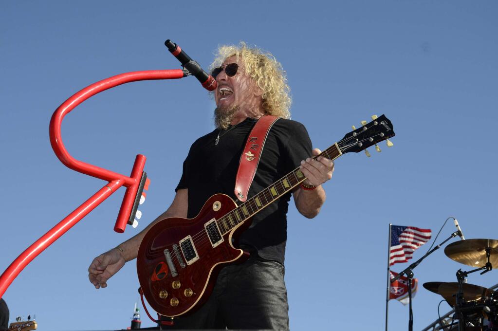 Sammy Hagar performs before the NASCAR Sprint Cup Series auto race at Texas Motor Speedway in Fort Worth, Texas, Sunday, Nov. 8, 2015. (AP Photo/Larry Papke)