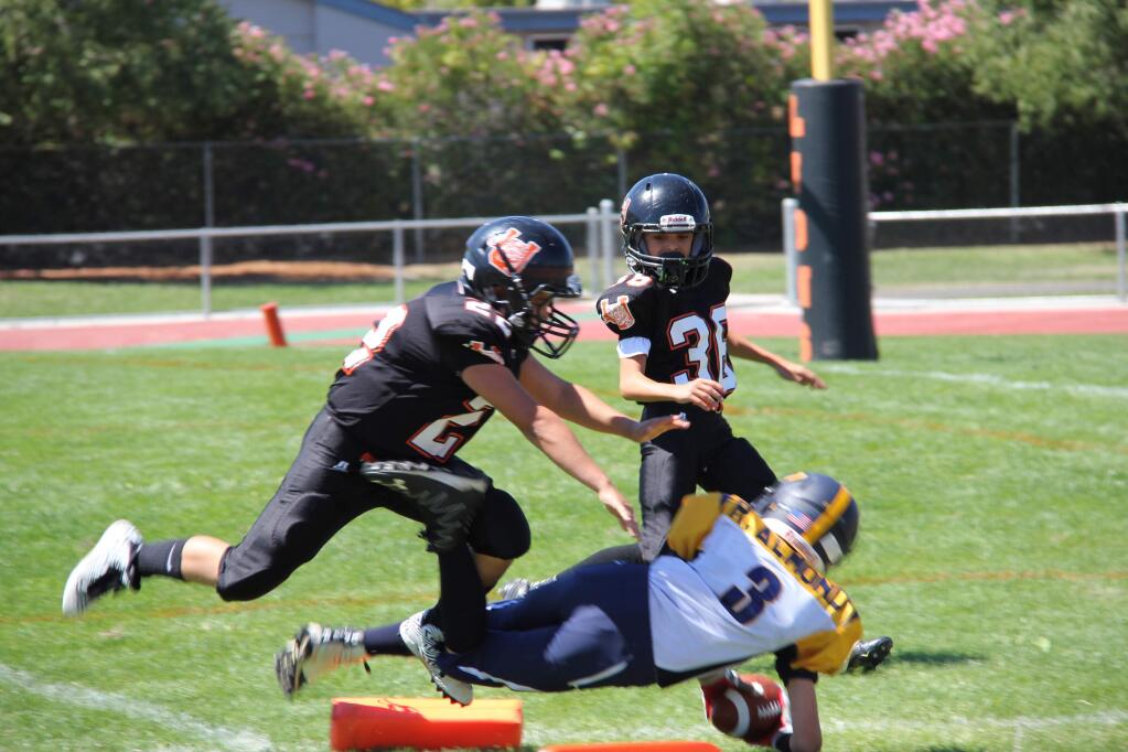 AMBER ALMOND PHOTOPetaluma Panthers' Robbie Almond divs for a touchdown in a 12-8 Pee Wee victory over Ukiah.