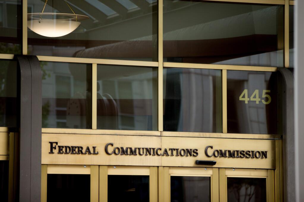The Federal Communications Commission is preparing to rescind net neutrality rules requiring internet service providers to give equal access to all online traffic. (ANDREW HARNIK / Associated Press)