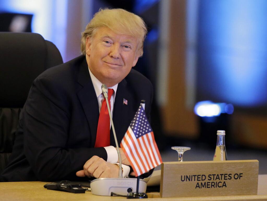 U.S. President Donald Trump smiles during the ASEAN-U.S. 40th Anniversary Commemorative Summit in Manila, Philippines Monday, Nov. 13, 2017. (AP Photo/Aaron Favila, Pool)
