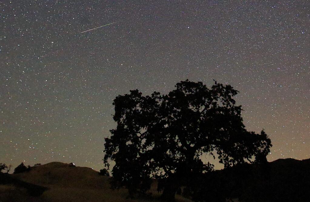 The Perseid meteor shower above Geysers Road in Geyserville, Friday morning August 12, 2016. (Kent Porter / Press Democrat) 2016