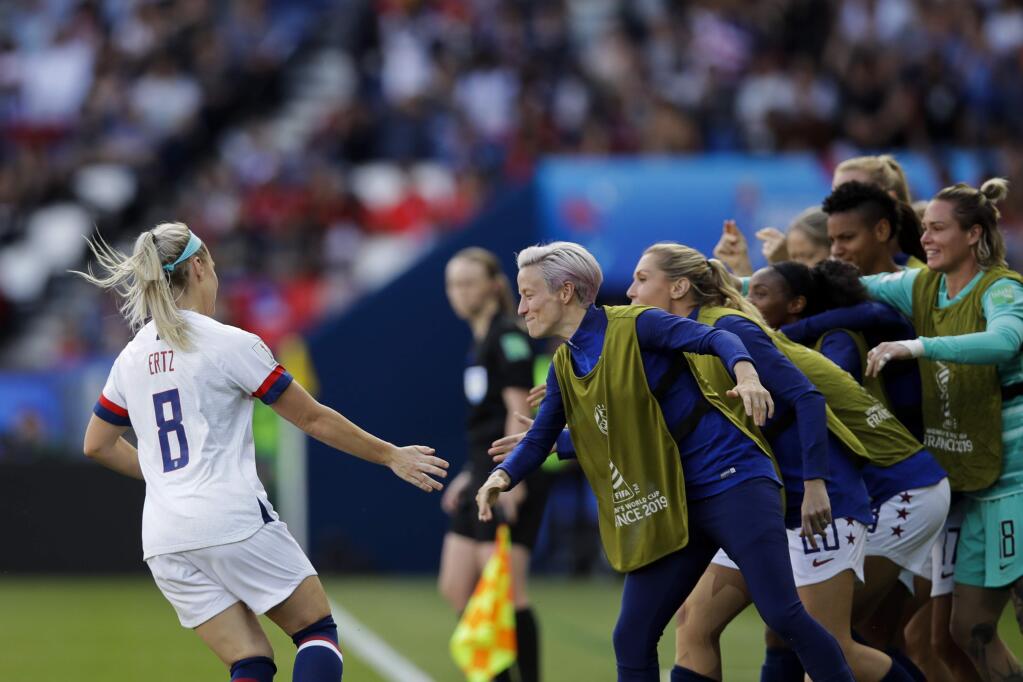 United States' Julie Ertz, left, celebrates with teammates after scoring their second goal during the Women's World Cup Group F soccer match between United States and Chile at Parc des Princes in Paris, France, Sunday, June 16, 2019. (AP Photo/Alessandra Tarantino)