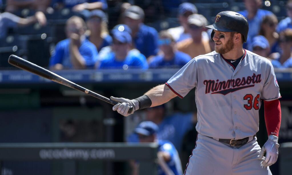 The Minnesota Twins' Robbie Grossman at bat against the Kansas City Royals during the first inning in Kansas City, Mo., Sunday, Sept. 16, 2018. (AP Photo/Reed Hoffmann)