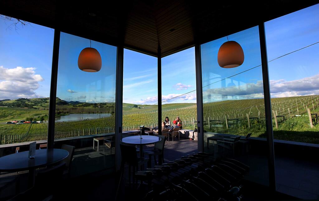 Sweeping views of the carneros region of Sonoma and Napa County are afforded from the modern tasting room and deck at Cuvaison Winery. (Kent Porter / Press Democrat) 2010
