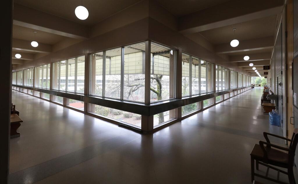 Hallways in the Sonoma County Superior Court are empty as the number of cases heard are reduced in response to the coronavirus, in Santa Rosa on Wednesday, March 18, 2020. (Christopher Chung/ The Press Democrat)