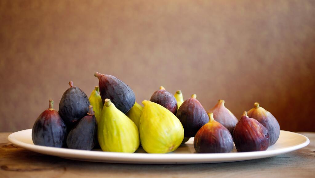 A platter of assorted figs, including the Brown Turkey Fig, at the far right. (Alvin Jornada / The Press Democrat)