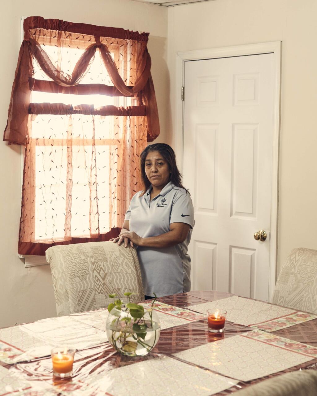 Victorina Morales at her home in Bound Brook, N.J., Nov. 2, 2018. At the president's New Jersey golf course, Morales, an undocumented immigrant, has worked as a maid since 2013. She said she never imagined she “would see such important people close up.” (Christopher Gregory/The New York Times)