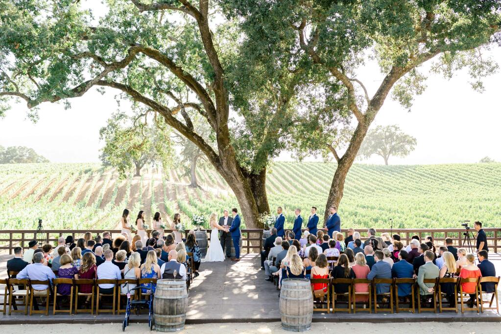 A view of pre-COVID-19 ceremonies: Sonoma Valley wineries Viansa and B.R. Cohn, whose parent company is Vintage Wine Estates, together hold more than 100 weddings each year. (Corinna Rose Photography)