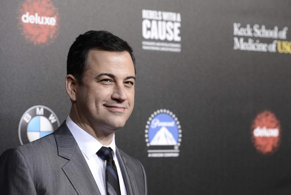 FILE - In this March 20, 2014, file photo, television personality and event host Jimmy Kimmel attends the 2nd Annual 'Rebels With a Cause' Gala benefiting the USC Center for Applied Molecular Medicine at Paramount Pictures Studios in Los Angeles. The Oscars finally have a host: Kimmel will emcee the 89th Academy Awards. Kimmel will be hosting the show for the first time, the Academy of Motion Pictures announced Monday, Dec. 5, 2016. (Photo by Dan Steinberg/Invision/AP, File)