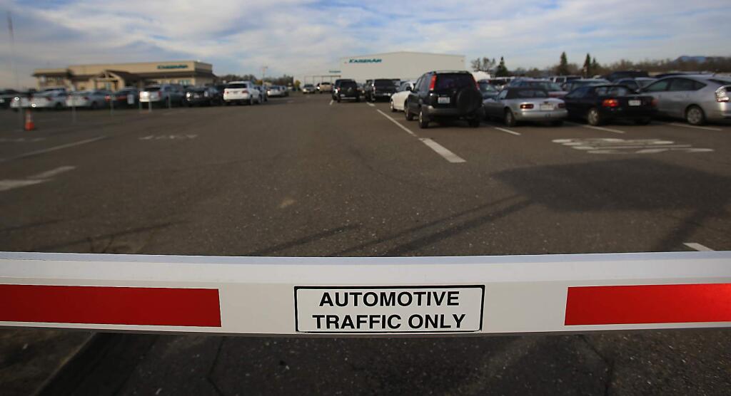 Under a new proposal, long-term parking would be expanded at the Charles M. Schulz-Sonoma County Airport, Tuesday, Feb. 9, 2016. (Kent Porter/ Press Democrat )