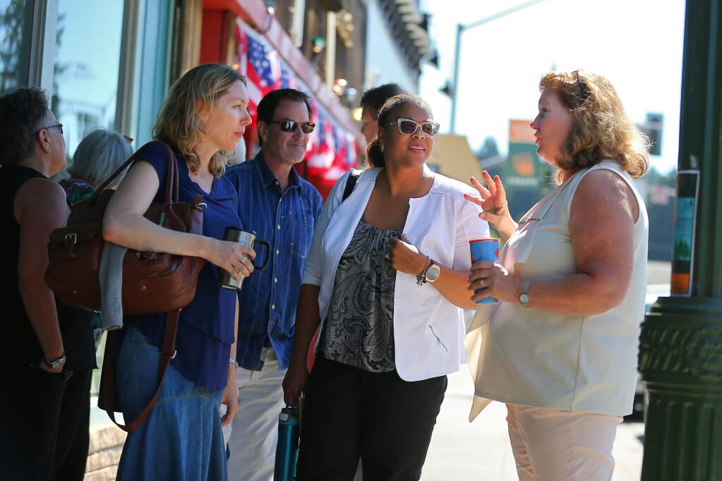 Newly appointed executive director at Sonoma County Economic Development Board Sheba Person-Whitley, center, talks with Sonoma County Supervisor Lynda Hopkins, left and Elise VanDyne during an introduductory tour in Guerneville on Tuesday, July 2, 2019. (Christopher Chung/ The Press Democrat)