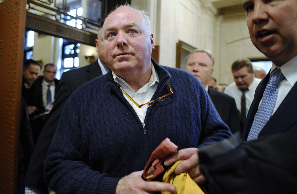 FILE - In this Feb. 24, 2016, file photo, Michael Skakel leaves the state Supreme Court after his hearing in Hartford, Conn. The Connecticut Supreme Court has vacated Kennedy cousin Michael Skakel's murder conviction and ordered a new trial in connection with a 1975 killing in wealthy Greenwich. The court issued a 4-3 ruling Friday, May 4, 2018, that Skakel's trial attorney, Michael Sherman, failed to present evidence of an alibi. (AP Photo/Jessica Hill, File)