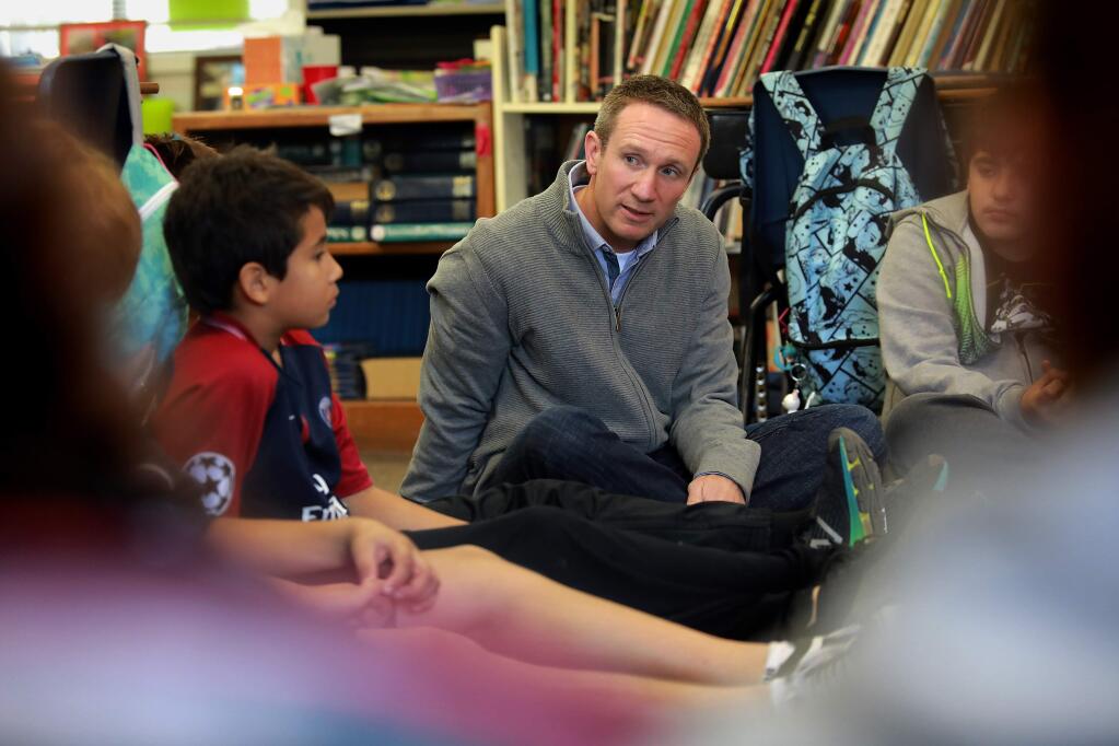 Hidden Valley school psychologist Matt Parks listens to students discuss their reaction to the fire during a restorative circle at the elementary school. (photo by John Burgess/The Press Democrat)