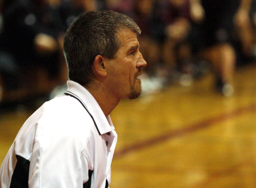 Sonoma Valley's Roger “Deets” Winslow watches his wrestlers take on Healdsburg High rivals in 2009. (CRISTA JEREMIASON/ PD FILE)