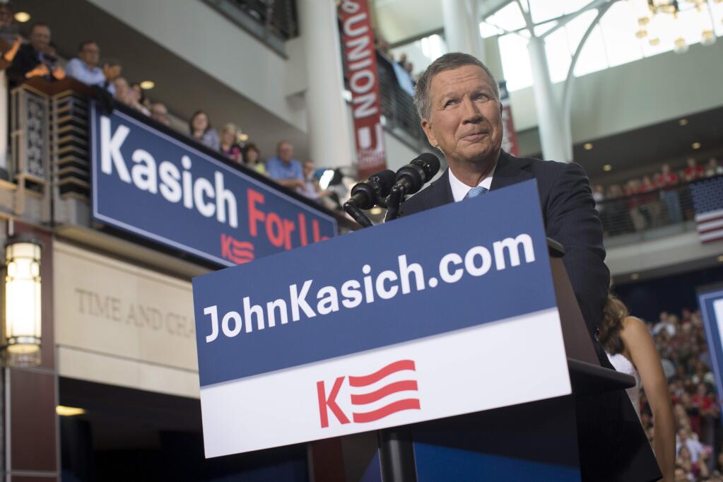 Ohio Gov. John Kasich announces he is running for the 2016 Republican partyís nomination for president during a campaign rally at Ohio State University, Tuesday, July 21, 2015, in Columbus, Ohio. Kasich, 63, launched his campaign before a crowd of 2,000 at an event marking the entry of a strong-willed and sometimes abrasive governor in a nomination race now with 16 notable Republicans. (AP Photo/John Minchillo)