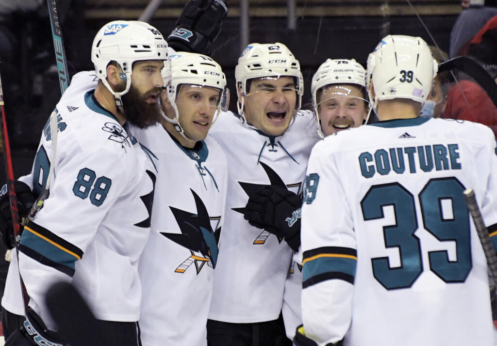 San Jose Sharks right wing Timo Meier, center, celebrates his goal with teammates during the second period against the New Jersey Devils, Tuesday, Nov. 30, 2021, in Newark, New Jersey. (Bill Kostroun / ASSOCIATED PRESS)