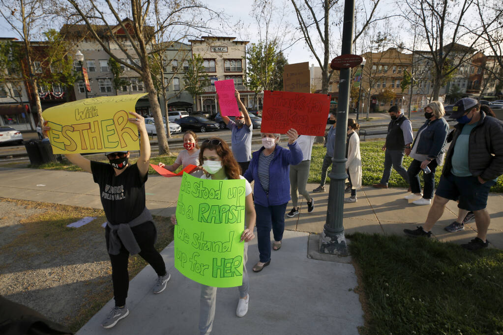 Supporters of Windsor council member Esther Lemus walk together during a rally at the Town Green in Windsor, Calif., on Sunday, April 11, 2021. (Beth Schlanker/ The Press Democrat)