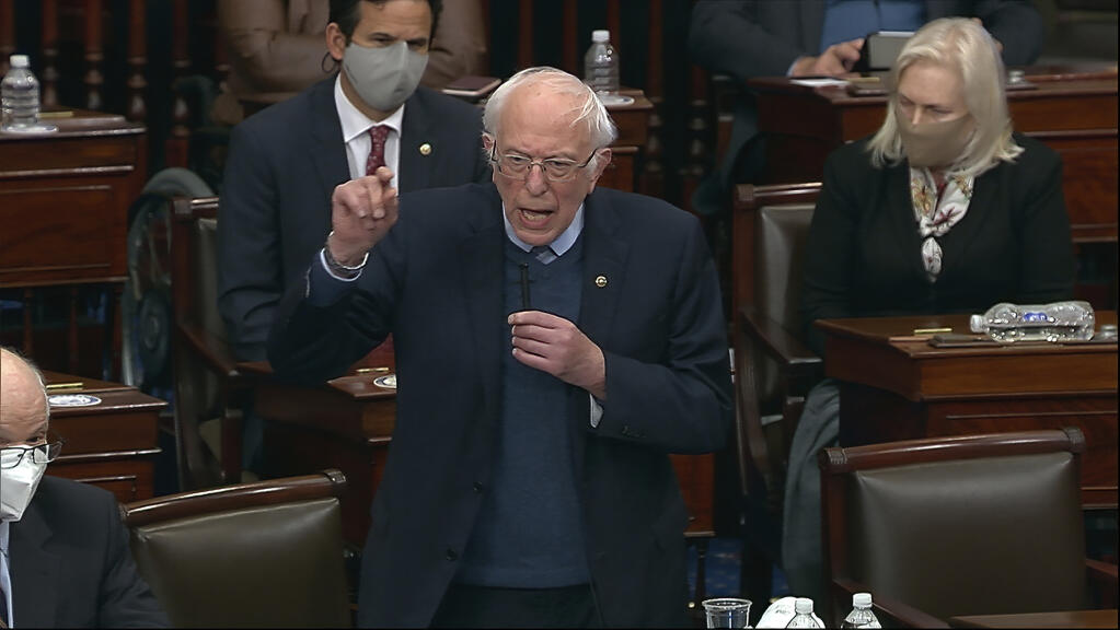 In this image from video, Sen. Bernie Sanders, I-Vt., speaks during debate in the Senate at the U.S. Capitol in Washington, Saturday, March 6, 2021. (Senate Television via AP)
