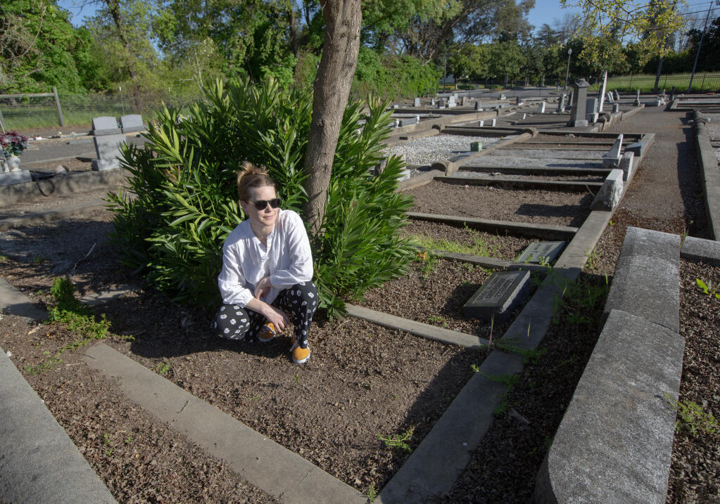 Director of the Sonoma Arts Live Production of ‘The Hello Girls’ Maeve Smith at the graveyard on East Napa Street where Hello Girl Juliette Louise Courtial Smith is buried in an unmarked grave. With the support of the American Legion, Smith spearheaded the effort to get Courtial a proper headstone, and the U.S. World War I Centennial Commission is seeking support to get Congressional Gold Medal legislation for the Hello Girls for their service. Photo taken on Monday, April 8, 2024. (Robbi Pengelly/Index-Tribune)