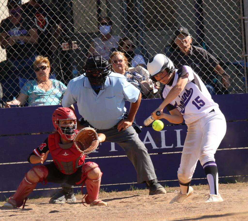 Logan Pomi connects for a home run in Petaluma’s win over Montgomery on May 10, 2021. (DWIGHT SUGIOKA FOR THE ARGUS-COURIER)