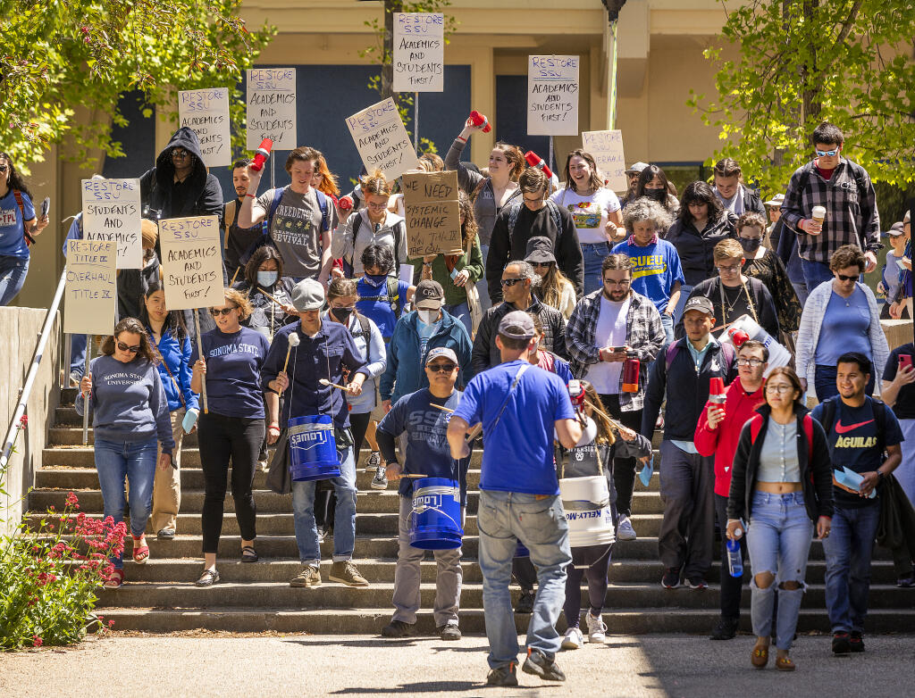 About 150 faculty and students held a rally Thursday, April 28, 2022, and march around the SSU campus in advance of the Academic Senate meeting. (John Burgess / The Press Democrat)