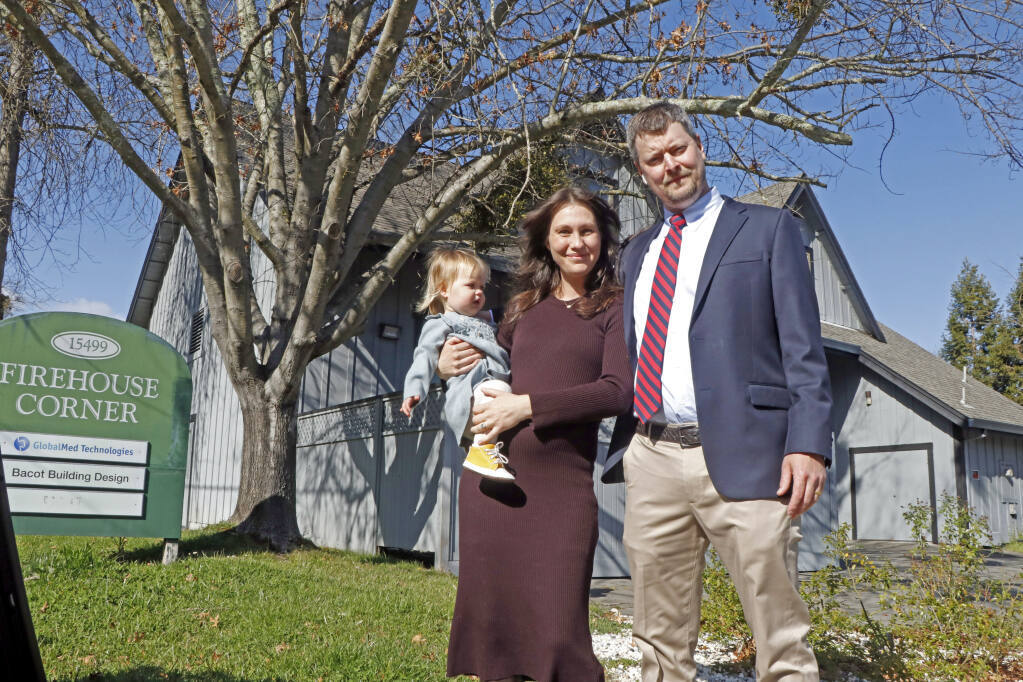 Eva with parents Samantha and John Loe in front of the Glen Ellen site where they have applied to open the first Loe Firehouse Dispensary. (Christian Kallen/Sonoma Index-Tribune)
