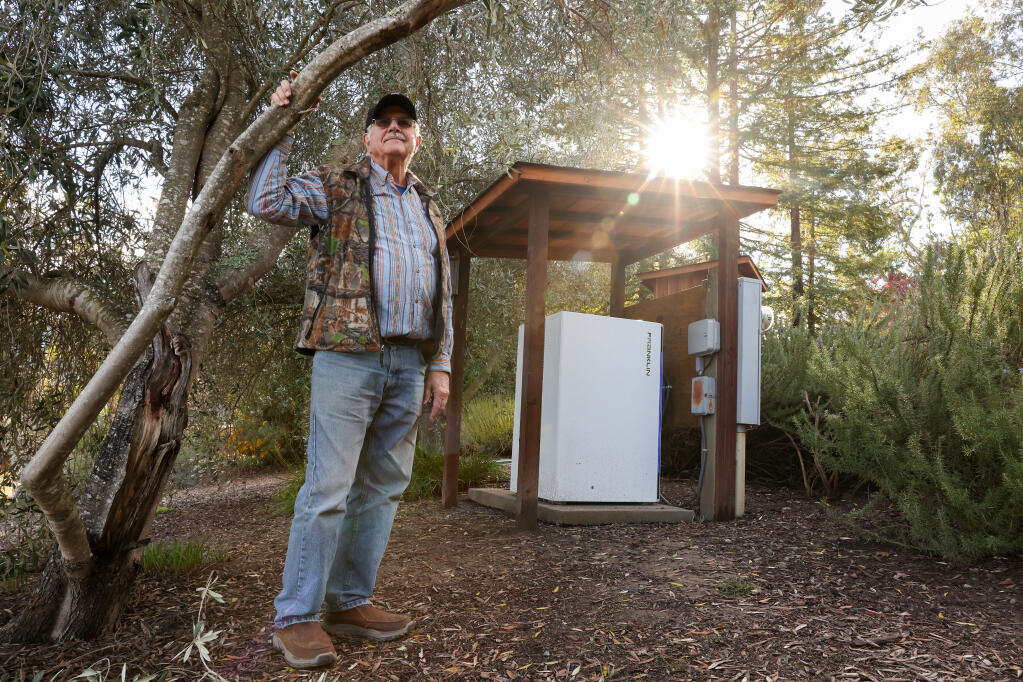 Craig Harrison installed an electric battery storage unit at his Bennett Valley area home due to frequent power outages. Harrison loses power at his home at least once a month.  Photo taken in Santa Rosa on Monday, December 12, 2022.  (Christopher Chung/The Press Democrat)