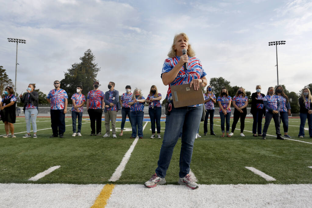 Principal Shauna Ferdinandson addresses the student body, teachers and staff during a rally on the first day of class at West County High School, on the former Analy High School campus, in Sebastopol, Calif., on Thursday, Aug. 12, 2021. (Beth Schlanker/The Press Democrat, 2021)
