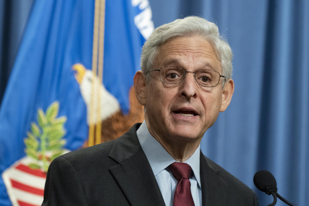 Attorney General Merrick Garland speaks during a news conference at the Department of Justice in Washington, Thursday, Aug. 4, 2022. The U.S. Justice Department announced civil rights charges Thursday against four Louisville police officers over the drug raid that led to the death of Breonna Taylor, a Black woman whose fatal shooting contributed to the racial justice protests that rocked the U.S. in the spring and summer of 2020. (AP Photo/Manuel Balce Ceneta)