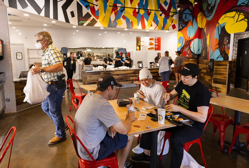 The new Dave’s Hot Chicken restaurant in Santa Rosa held a soft opening Wednesday, Sept. 22, with invited guests as an opportunity to train staff. (John Burgess / The Press Democrat)
