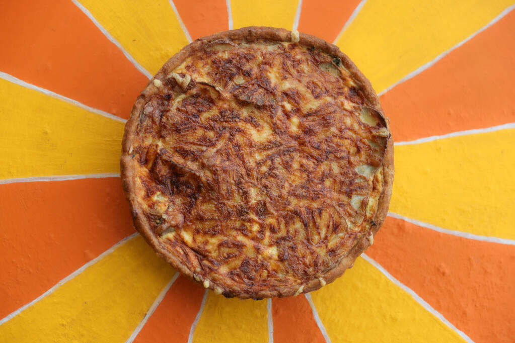 Seasonal quiche made with potatoes, kale, caramelized onions, and Gouda cheese by Ursule Amiot and Karl Gergel, owners of Zweibel’s in Santa Rosa, Monday, March 4, 2024. (Christopher Chung / The Press Democrat)