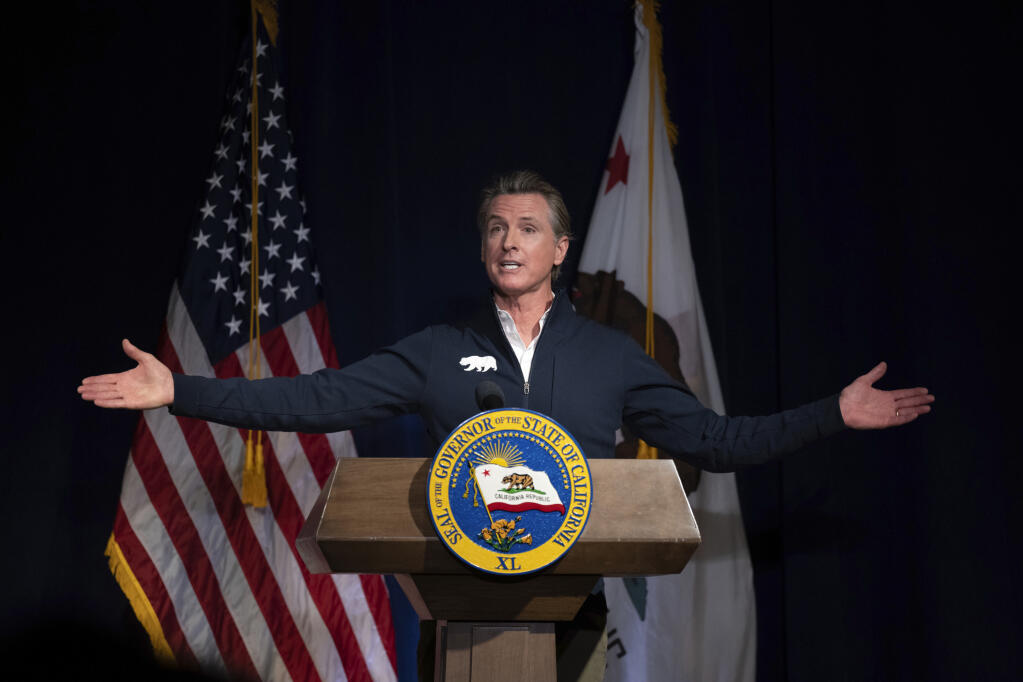 Gov. Gavin Newsom is facing a projected $22.5 billion budget shortfall after several years of large surpluses. (JOSÉ LUIS VILLEGAS / Associated Press)