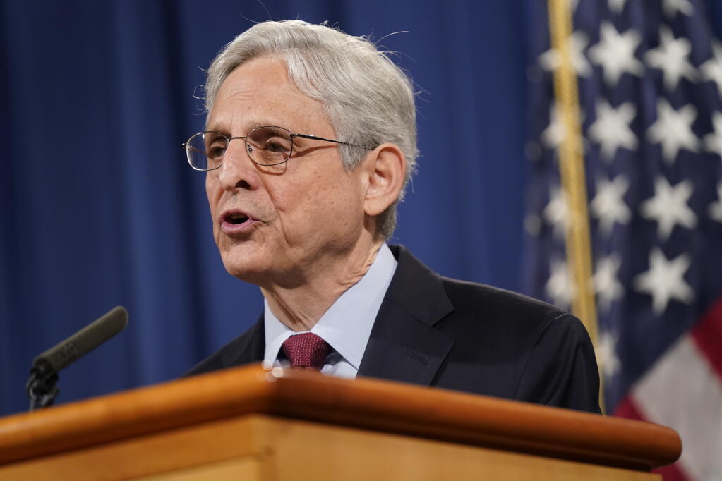 FILE - In this June 25, 2021 file photo, Attorney General Merrick Garland speaks during a news conference at the Department of Justice in Washington. The Justice Department is launching gun strike forces in five cities in the U.S. It is part of an effort to reduce spiking violent crime by addressing illegal trafficking and prosecuting offenses that help put guns in the hands of criminals. (AP Photo/Patrick Semansky, File)