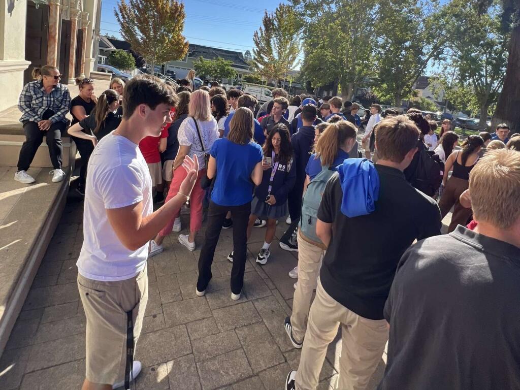 Students at St. Vincent de Paul High School walked to St. Vincent Church on Monday, Aug. 28, 2023 to protest the sudden departure of Principal Patrick Daly, which was announced the night before. (Photo by Mercer Stipp)