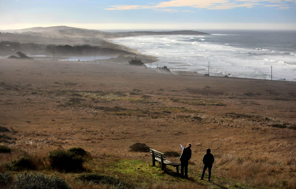 Melanie Parker, deputy director of Sonoma County Regional Parks, left, and Misti Arias, acquisition manager of the Sonoma County Agricultural Preservation and Open Space District, tour Carrington Ranch on the coastal bluff above Salmon Creek, Thursday, Dec. 31, 2020 north of Bodega Bay. The 335-acre ranch was transferred from the Open Space district to Regional Parks. (Kent Porter / The Press Democrat) 2020