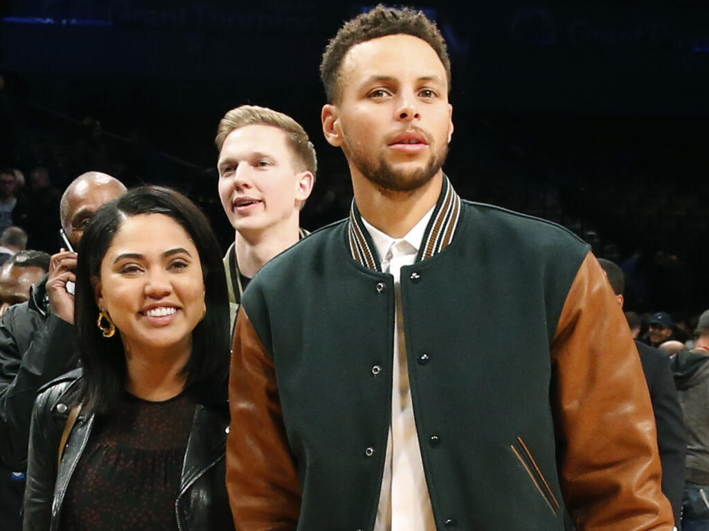 Stephen Curry, right, leaves the court with his wife Ayesha after watching the second half of an NCAA college basketball game between Penn State and Pittsburgh in the Legends Classic, Monday, Nov. 20, 2017, in New York. Penn State defeated Pittsburgh 85-54. (AP Photo/Kathy Willens)