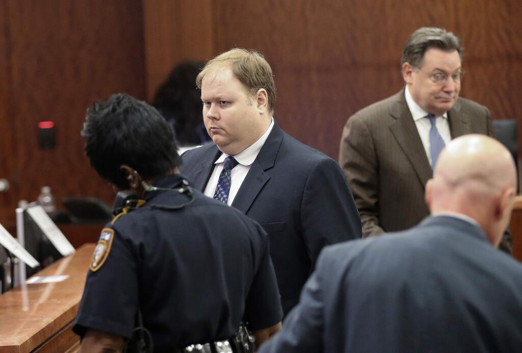 FILE - In this Aug. 27, 2019, file photo, Ronald Haskell, center, appears in Judge George Powell's courtroom for his capital murder trial in Houston. A jury has convicted Haskell of capital murder for fatally shooting six members of his ex-wife's family in Texas. Jurors on Thursday, Sept. 26, 2019, rejected Ronald Lee Haskell's insanity defense. His attorneys said Haskell believed voices in his head were telling him to kill the Stay family, including four children, at their suburban Houston home in 2014. (Steve Gonzales/Houston Chronicle via AP, File)