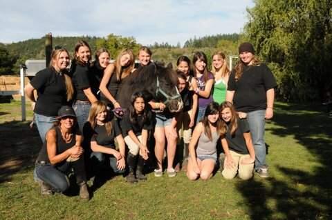 Midnight and some of the kids who help run The Pony Express at Howarth Park. (COURTESY PHOTO)
