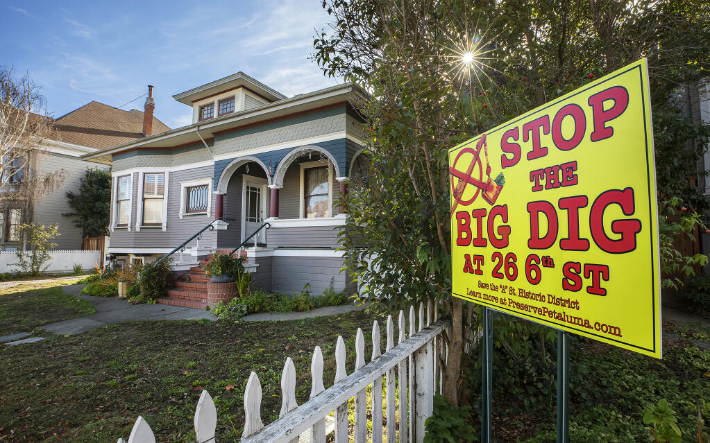 The neighbors of a 6th Street heritage home in Petaluma are campaigning to reverse the Petaluma Planning Department and Preservation Committee’s approval of a plan by owners Peter and Ginnie Haas to dig a 4,210-square-foot underground garage. (John Burgess / The Press Democrat)