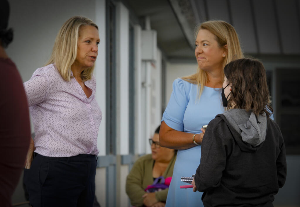 The new co-superintendents of the Old Adobe Union School District, Cindy Friberg, left, and Michele Gochberg chat with a reporter Aug. 17 on the first day back to school from summer break. (Crissy Pascual / Petaluma Argus-Courier)