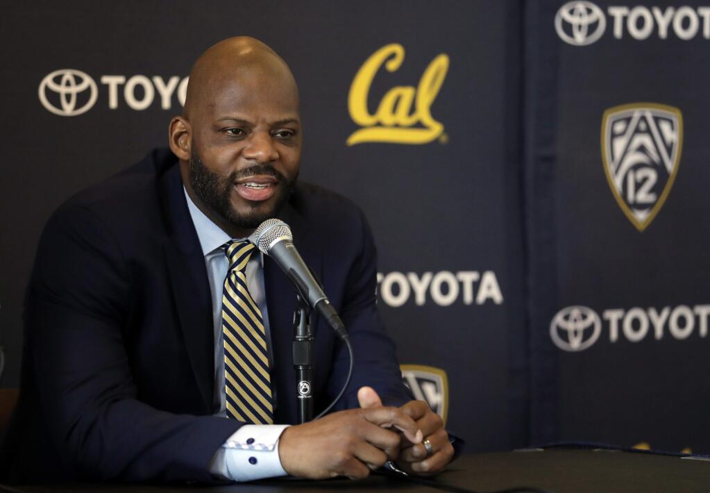 Wyking Jones fields questions during a NCAA college basketball press conference to announce his new appointment as California men's basketball coach Wednesday, March 29, 2017, in Berkeley, Calif. (AP Photo/Marcio Jose Sanchez)