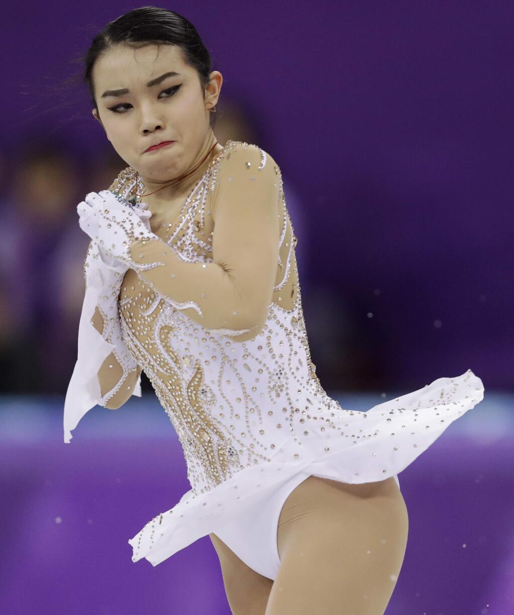 Karen Chen of the United States performs during the women's short program figure skating in the Gangneung Ice Arena at the 2018 Winter Olympics in Gangneung, South Korea, Wednesday, Feb. 21, 2018. (AP Photo/Bernat Armangue)