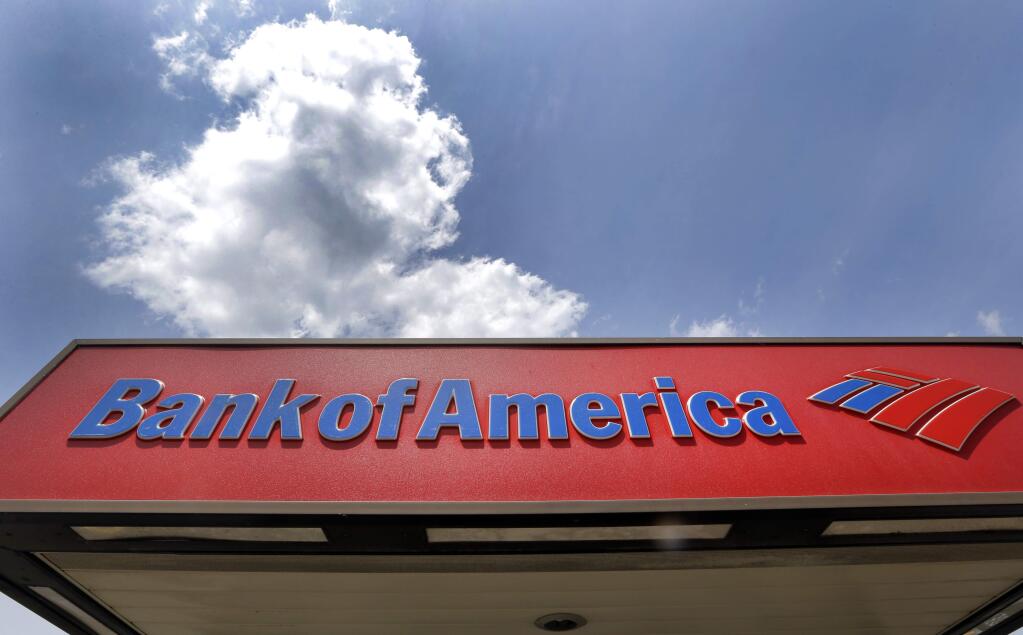 FILE - This Monday, July 18, 2016, file photo shows the top of a Bank of America ATM booth, in Woburn, Mass. On Thursday, June 22, 2017, the Federal Reserve said all of the 34 largest U.S. banks are fortified enough to withstand a severe U.S. and global recession and continue lending. The banks undergoing the seventh annual check-up included JPMorgan Chase & Co., Bank of America Corp., Citigroup Inc. and Wells Fargo and Co., which are the four biggest U.S. banks by assets. (AP Photo/Elise Amendola, File)